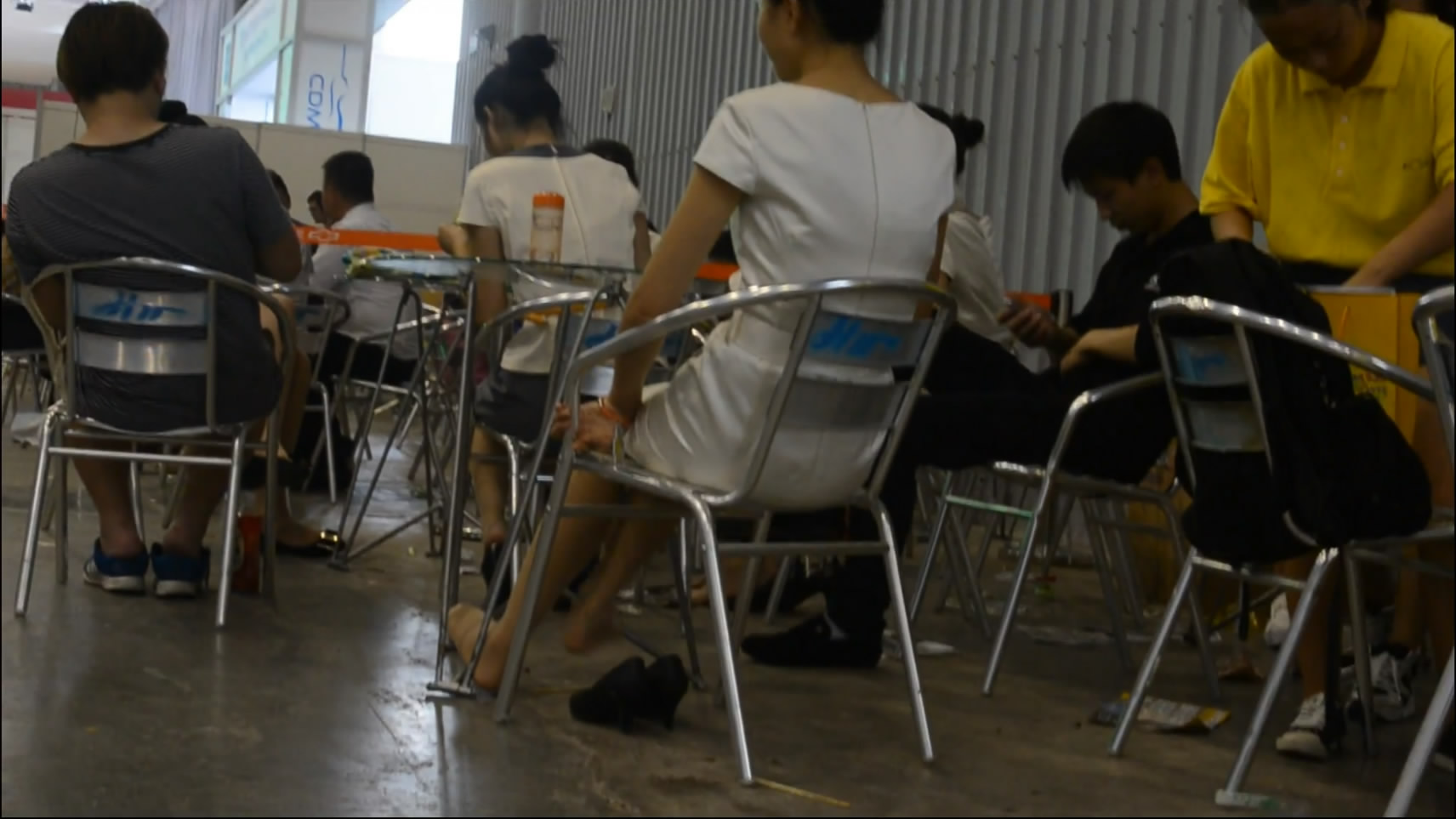 Sales Worker Have a Rest With Playing Feet